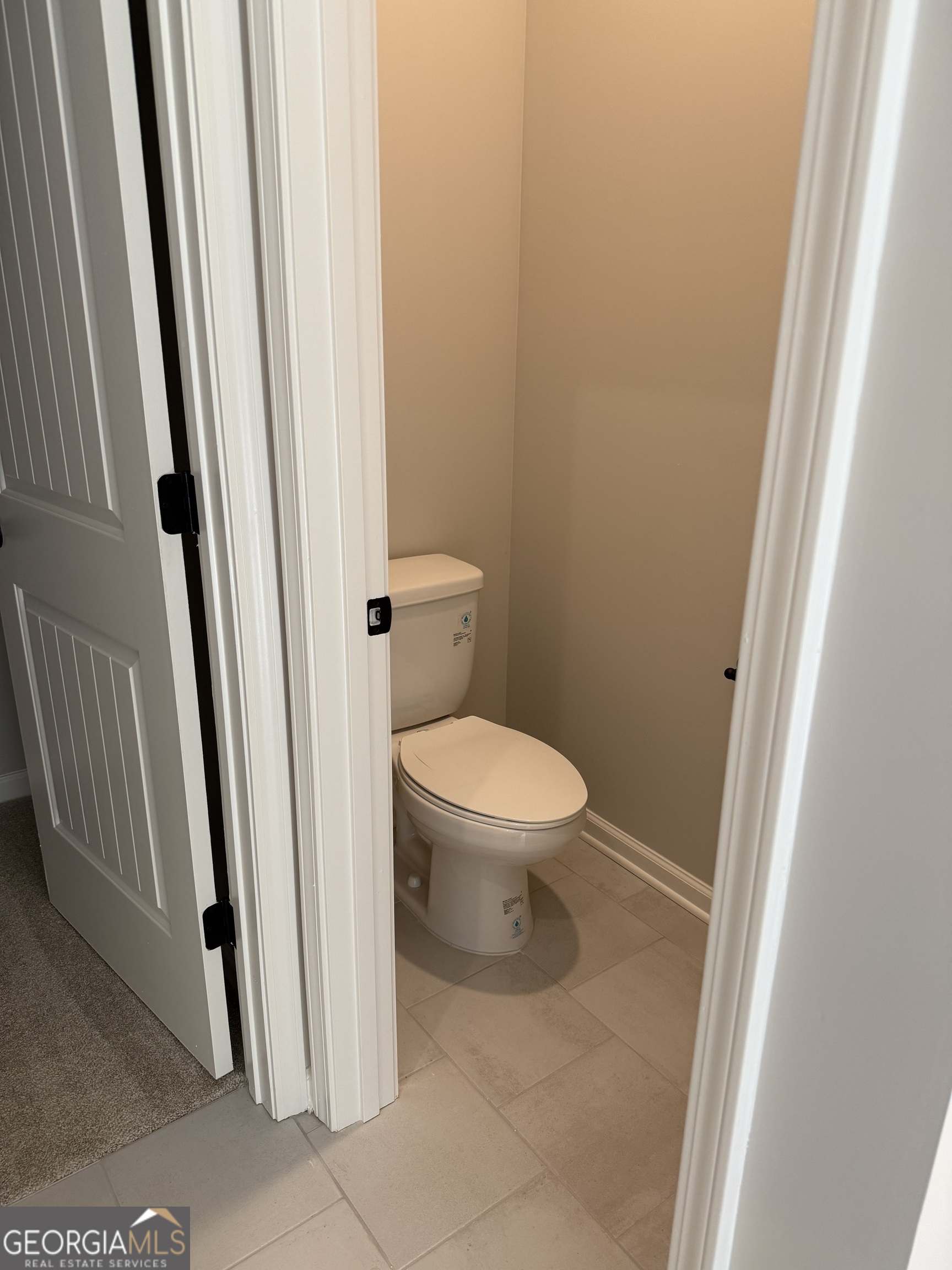 92 Commanche Circle Williamson, GA 30292 - Photo 44 of 53 a bathroom with a toilet and a shower