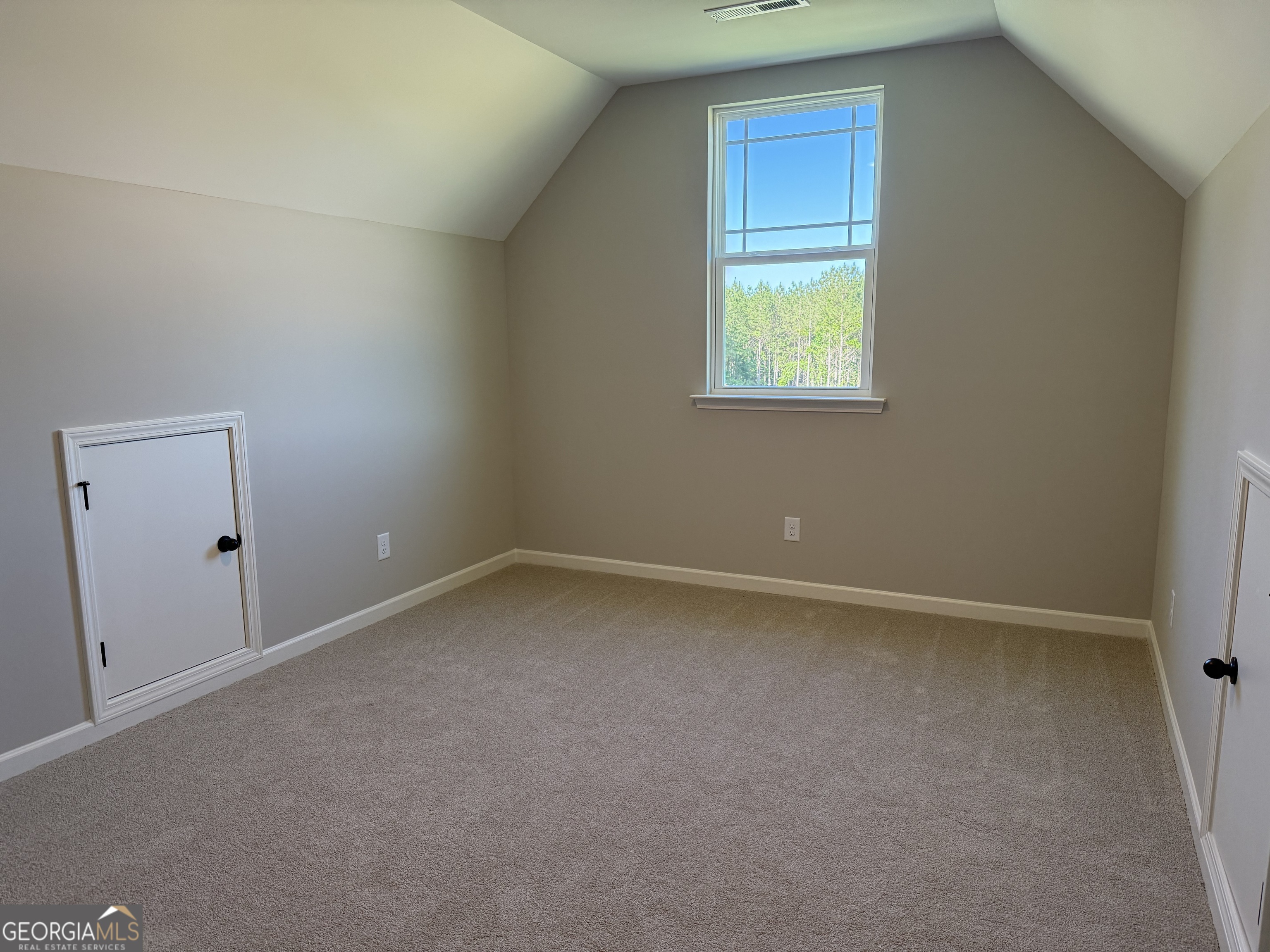 92 Commanche Circle Williamson, GA 30292 - Photo 53 of 53 a view of an empty room with a window