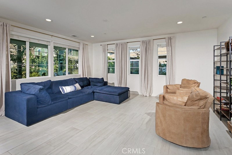 271 Rose Street Fillmore, CA 93015 - Photo 2 of 11 a living room with furniture and large windows