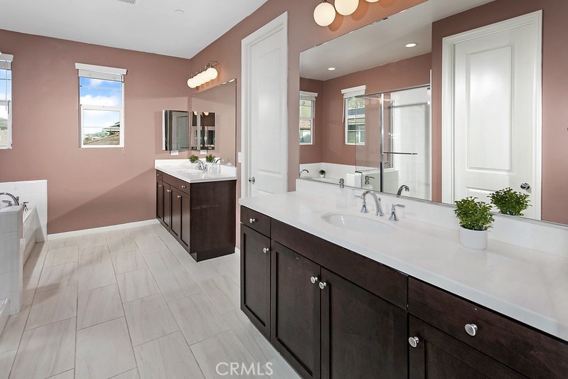271 Rose Street Fillmore, CA 93015 - Photo 5 of 11 a spacious bathroom with a sink double vanity and a mirror