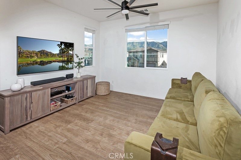 271 Rose Street Fillmore, CA 93015 - Photo 6 of 11 a living room with furniture and a flat screen tv