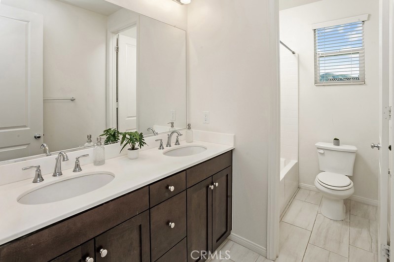 271 Rose Street Fillmore, CA 93015 - Photo 8 of 11 a bathroom with a sink and a mirror