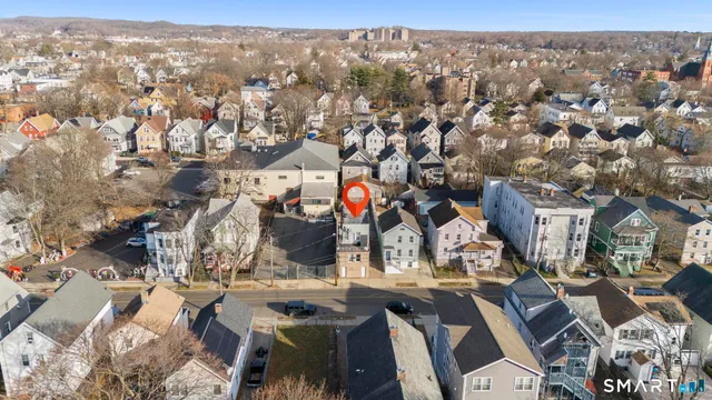 a view of a street with cars