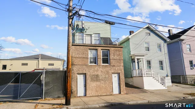 a view of a house with a garage