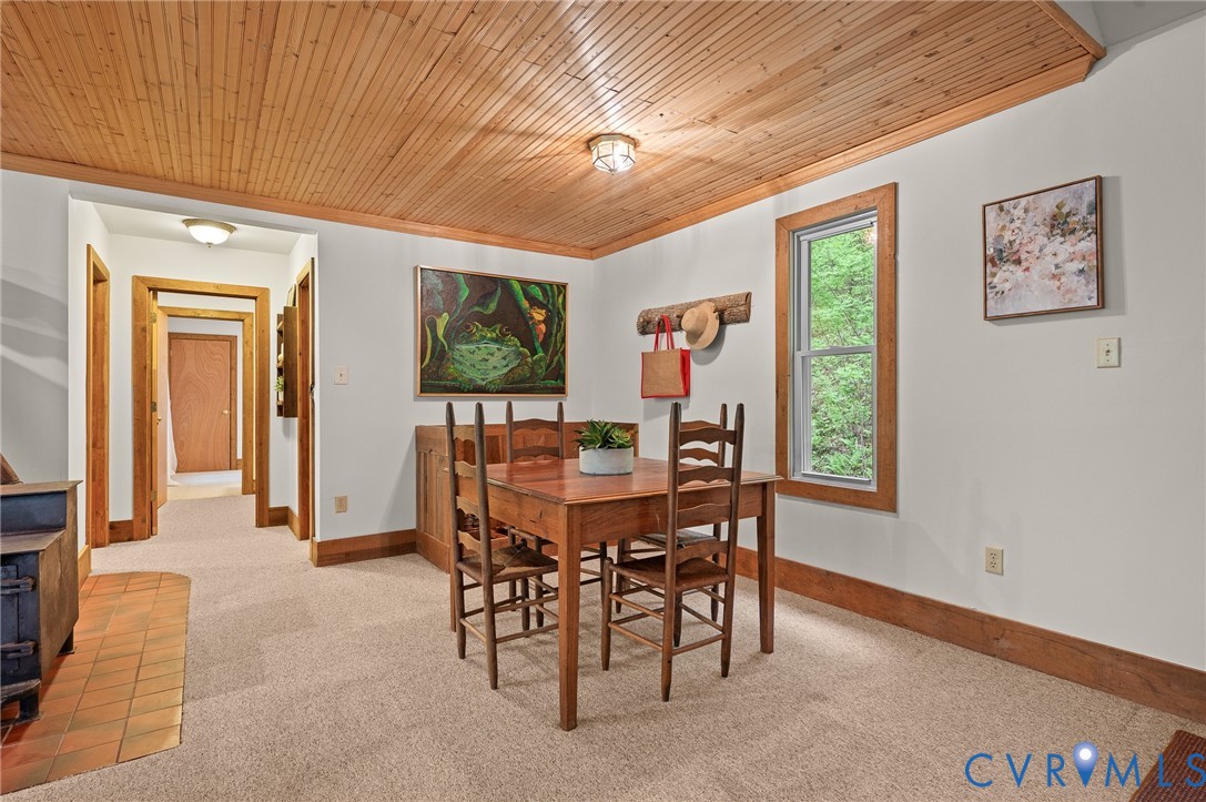 270 Little Cabin Road Amherst, VA 24521 - Photo 12 of 52 a view of a dining room with furniture window and wooden floor