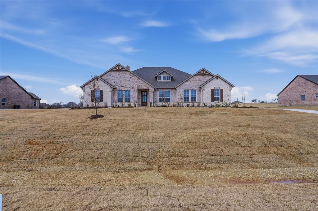 810 Vly Rdg Road Van Alstyne, TX 75495 - Photo 2 of 39 View of front of home featuring a front lawn and brick siding