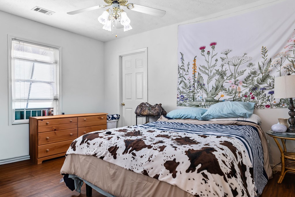 1085 Terry Lane Fortson, GA 31808 - Photo 13 of 21 a bedroom with a bed and a dresser