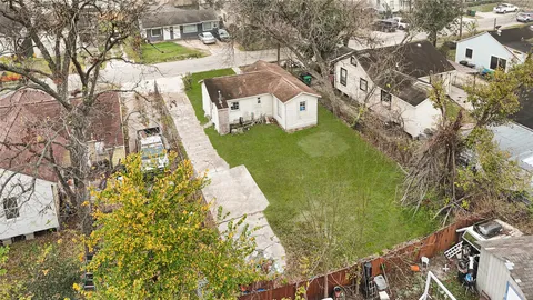 a view of swimming pool with a yard