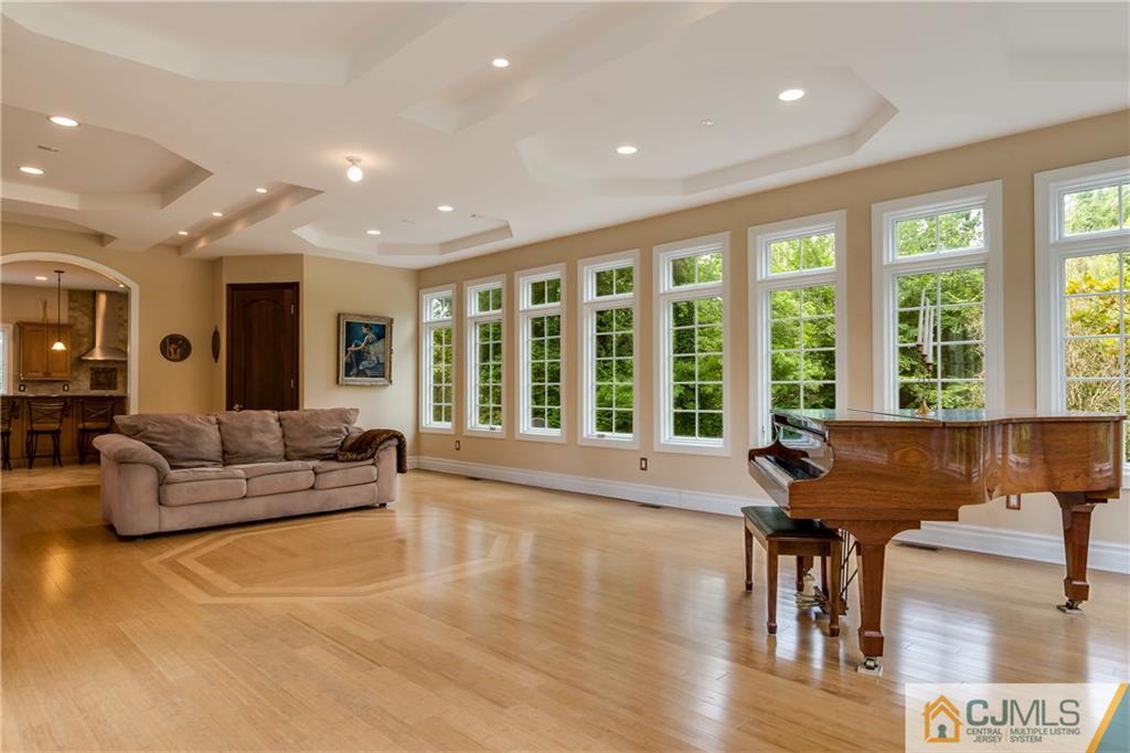 64 Stafford Road Colonia, NJ 07067 - Photo 15 of 25 a living room with furniture and floor to ceiling windows
