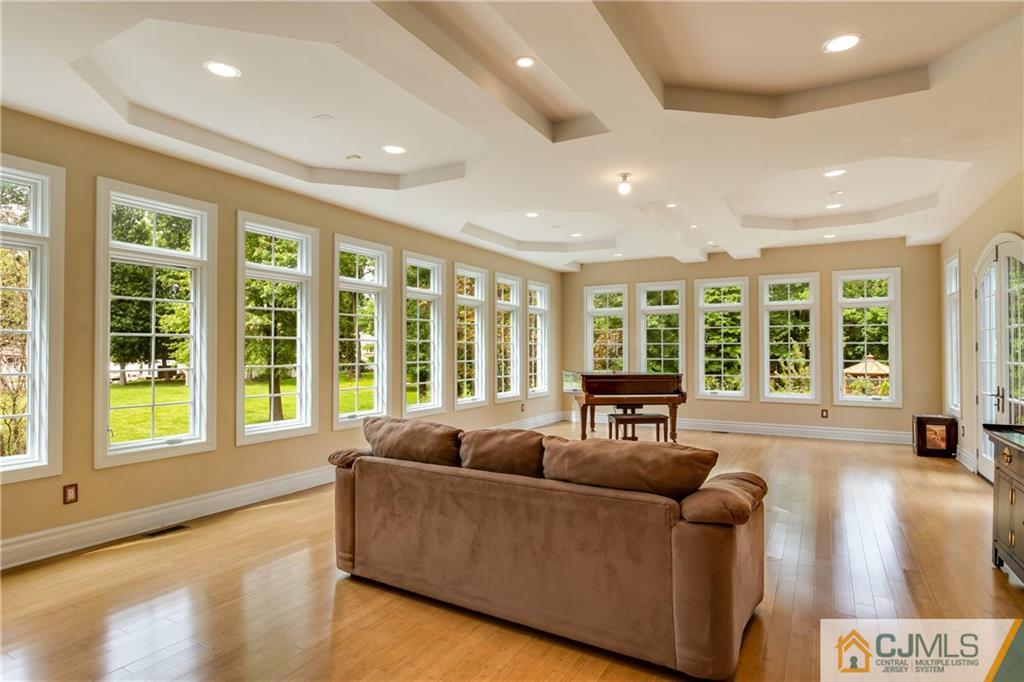 64 Stafford Road Colonia, NJ 07067 - Photo 16 of 25 a living room with furniture and large windows