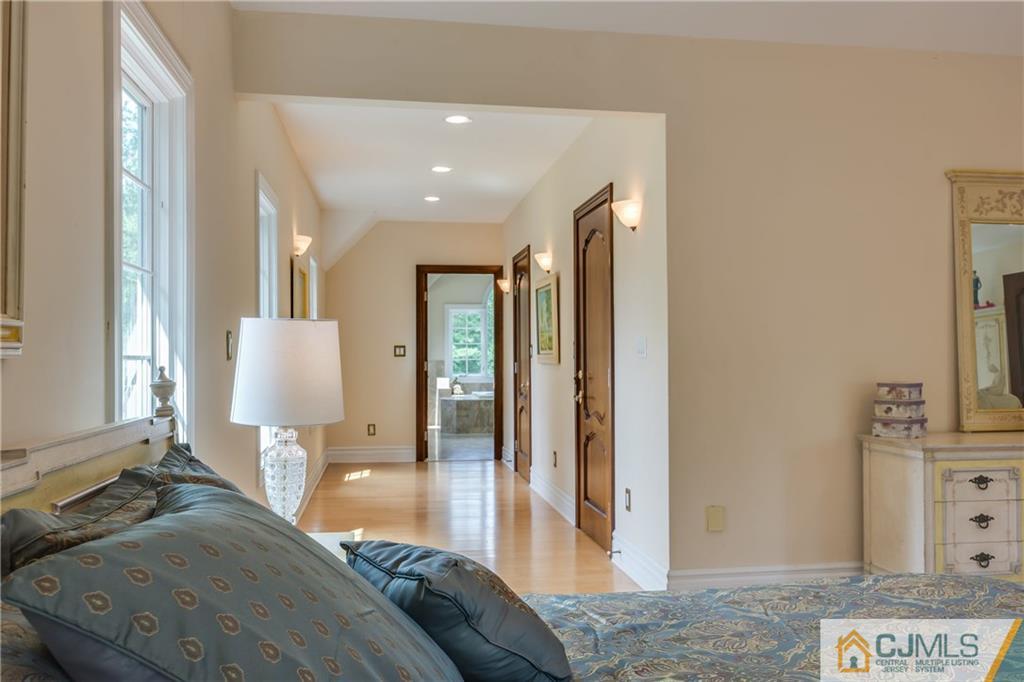 64 Stafford Road Colonia, NJ 07067 - Photo 21 of 25 a bedroom with a bed and wooden floor