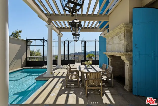 a dining room with a table and chairs