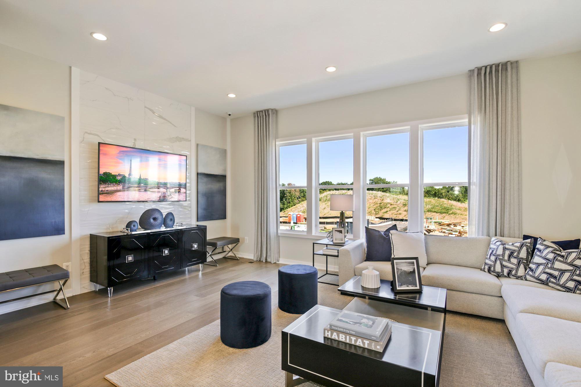 1772 Violet Ridge Place McLean, VA 22102 - Photo 5 of 19 a living room with furniture and a flat screen tv