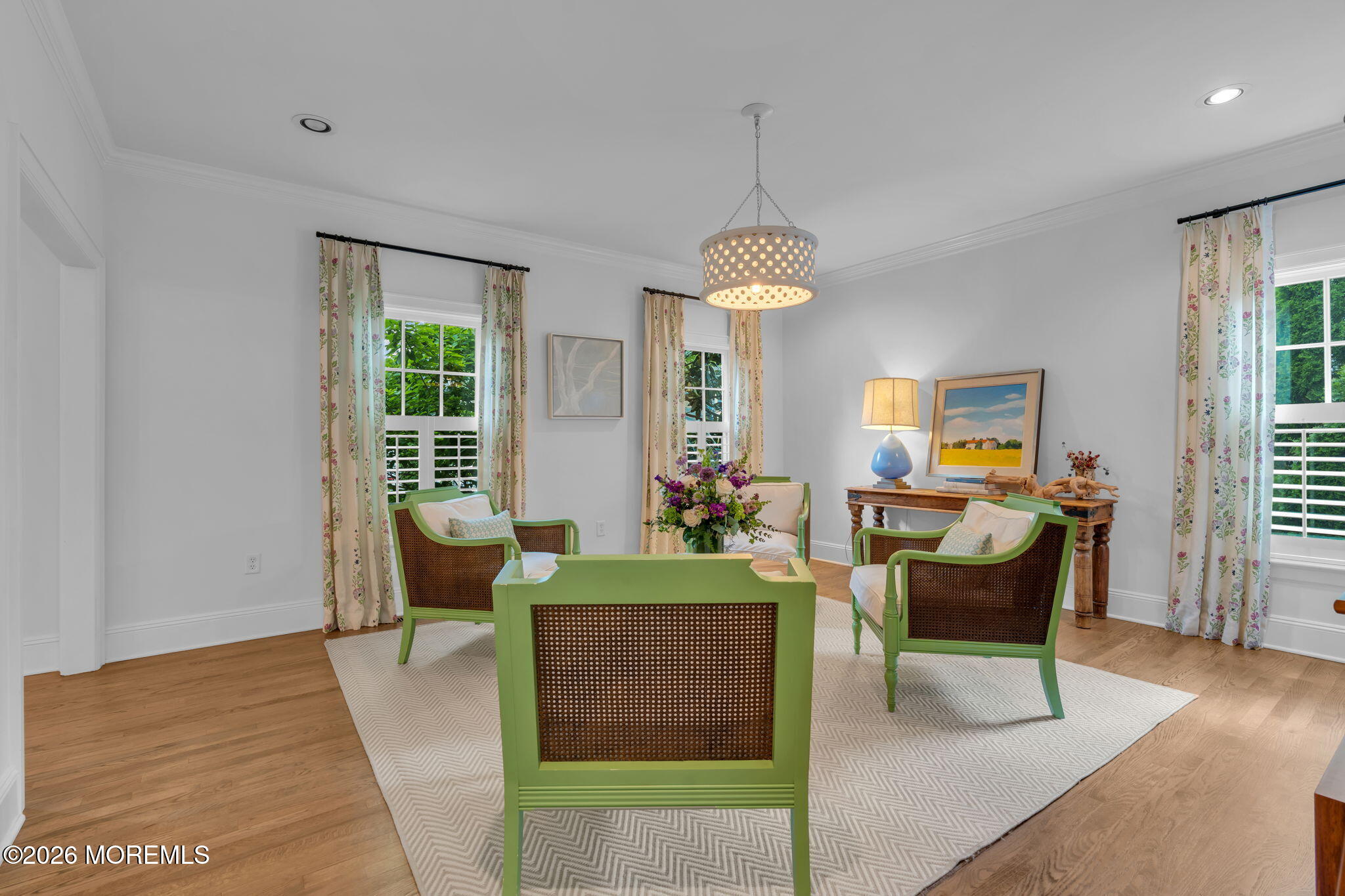 22 1st Street Rumson, NJ 07760 - Photo 17 of 44 a living room with furniture and a chandelier