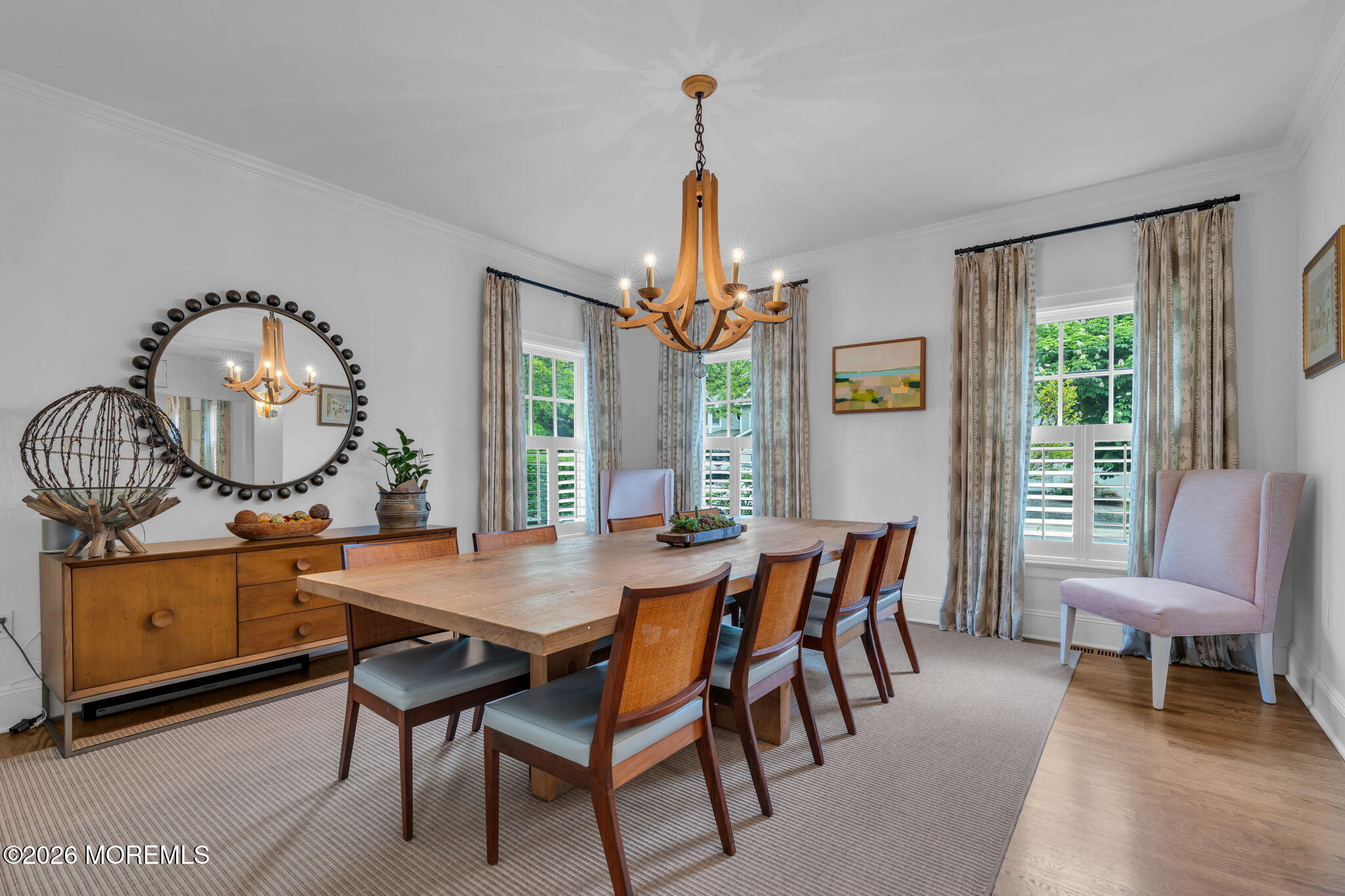 22 1st Street Rumson, NJ 07760 - Photo 19 of 44 a view of a dining room with furniture and chandelier