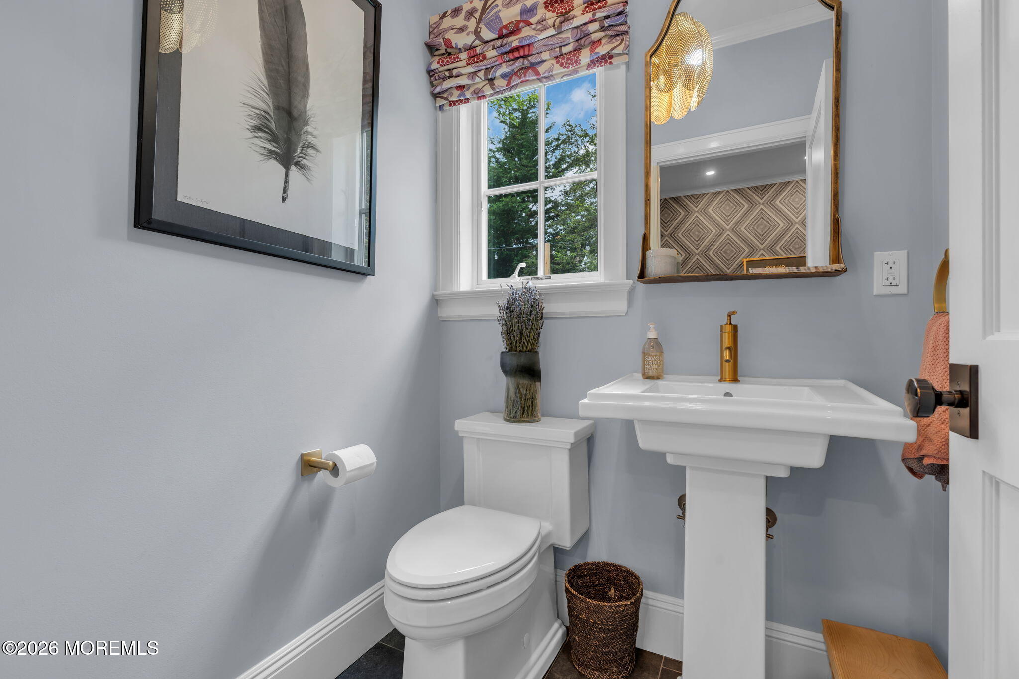 22 1st Street Rumson, NJ 07760 - Photo 24 of 44 a bathroom with a toilet and a sink