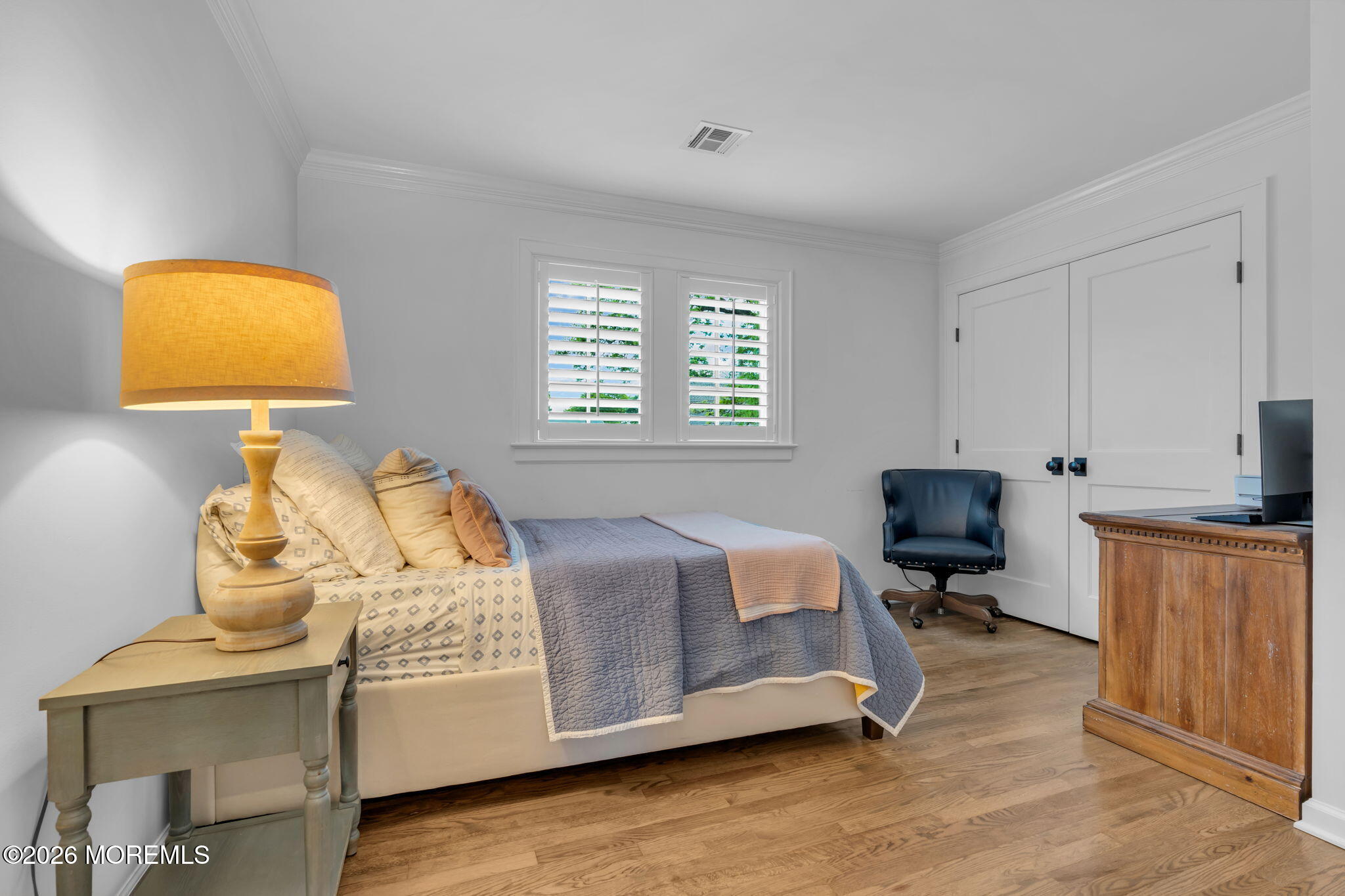 22 1st Street Rumson, NJ 07760 - Photo 32 of 44 a bedroom with bed and window