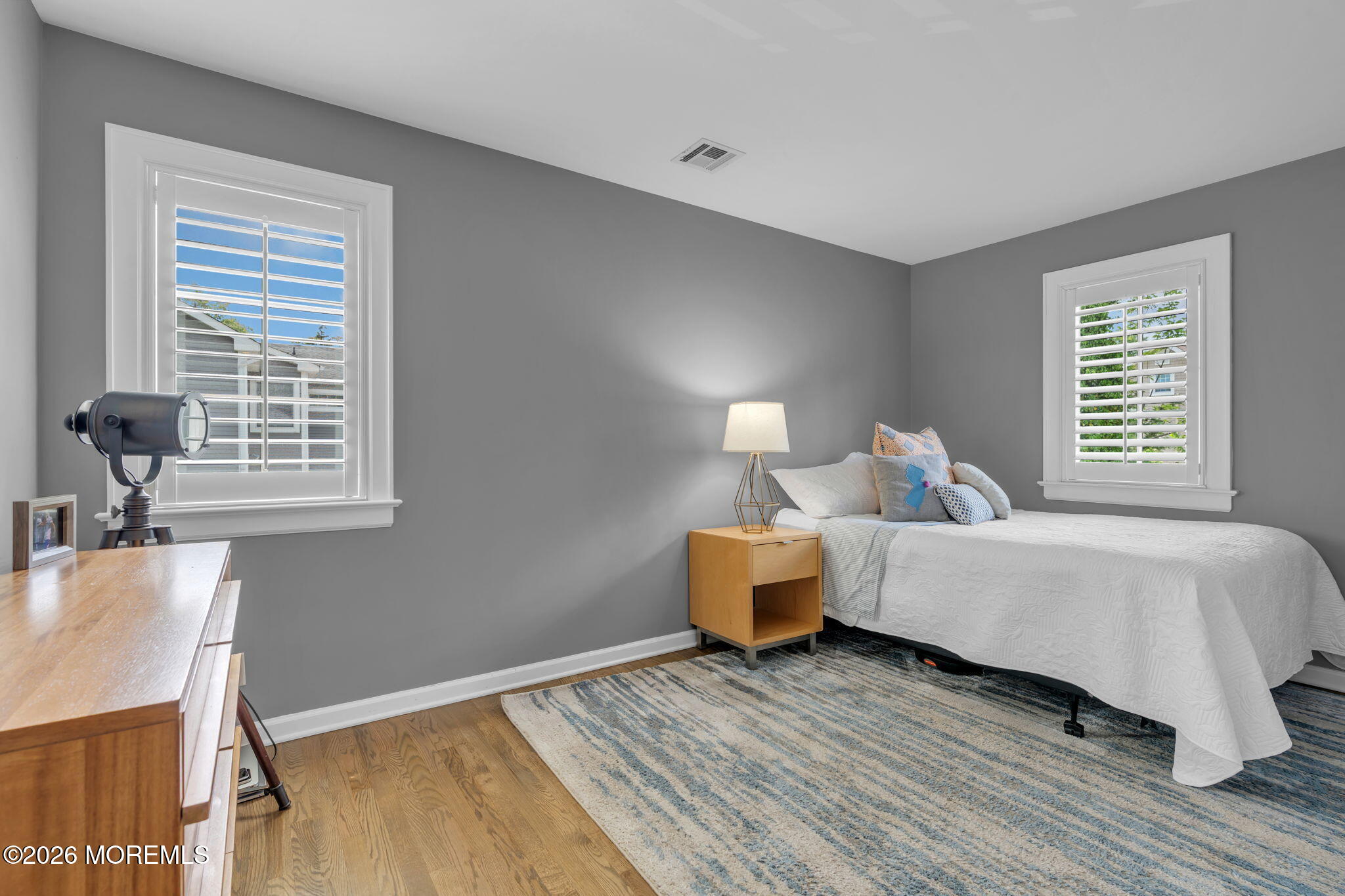 22 1st Street Rumson, NJ 07760 - Photo 33 of 44 a bedroom with bed and window