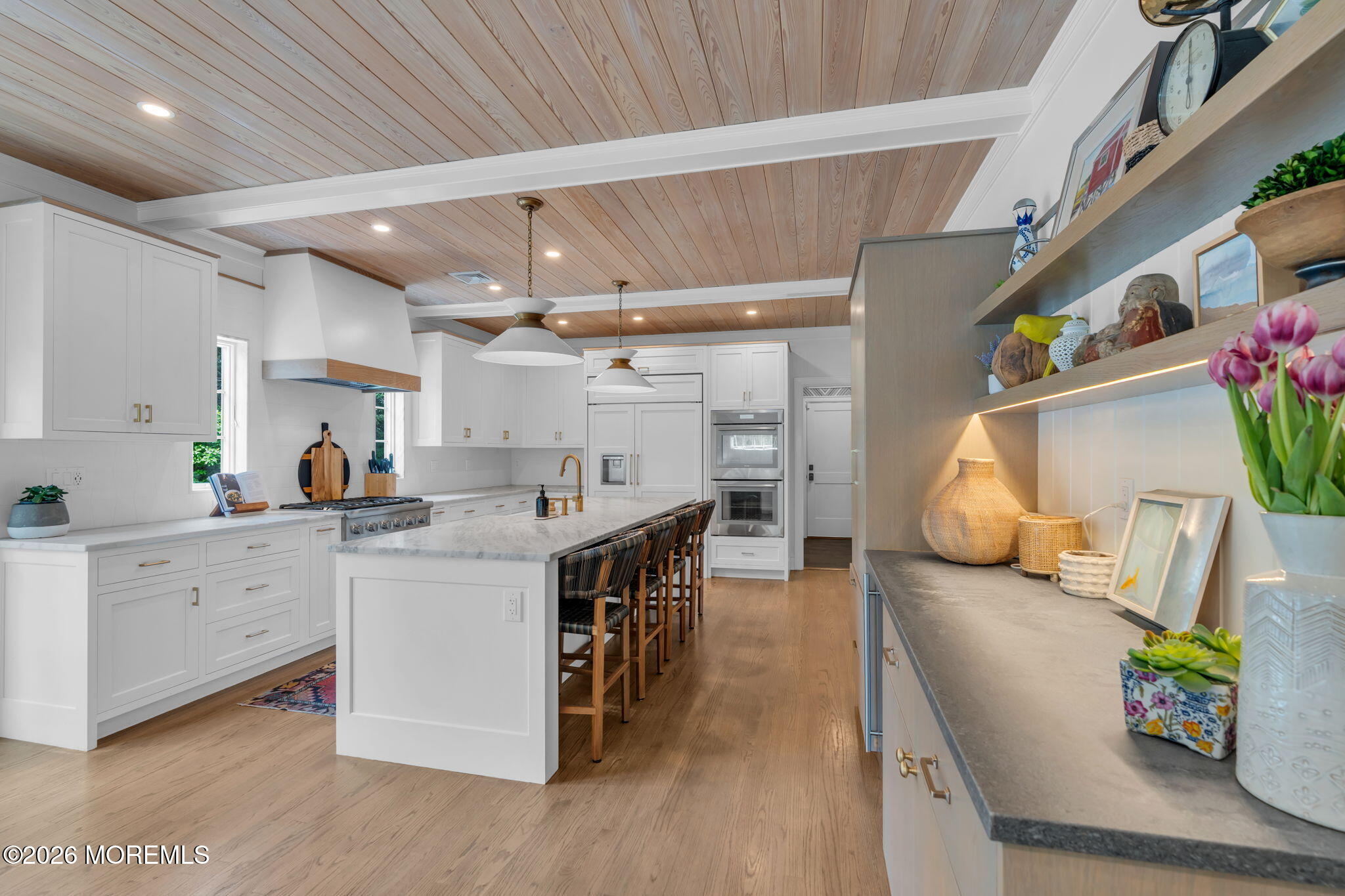 22 1st Street Rumson, NJ 07760 - Photo 8 of 44 a kitchen with furniture and a wooden floor