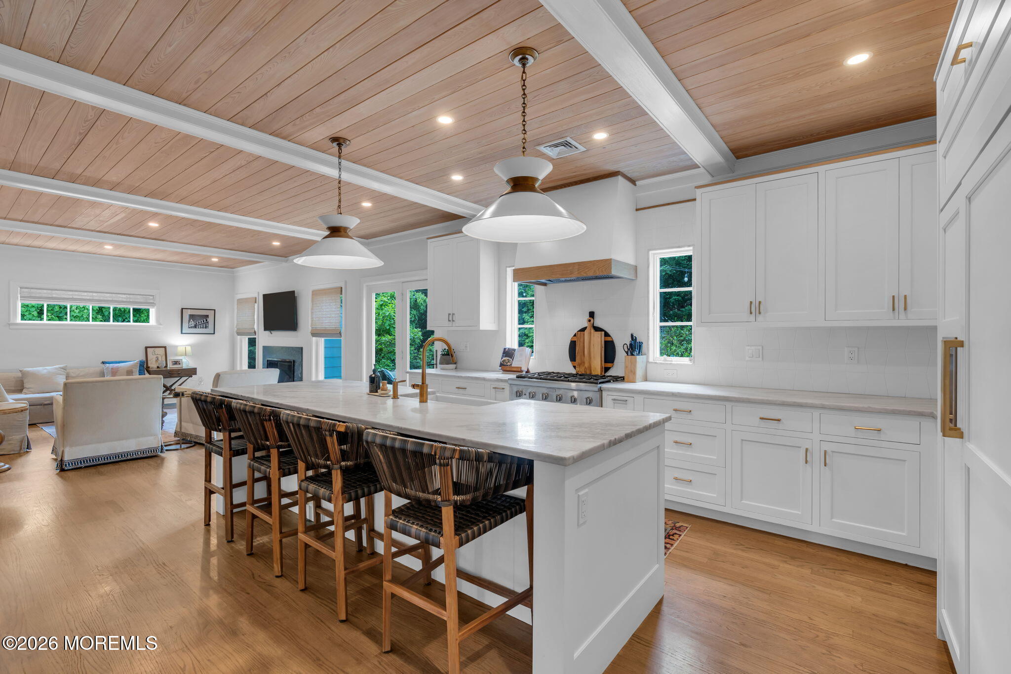22 1st Street Rumson, NJ 07760 - Photo 9 of 44 a large kitchen with a table and chairs