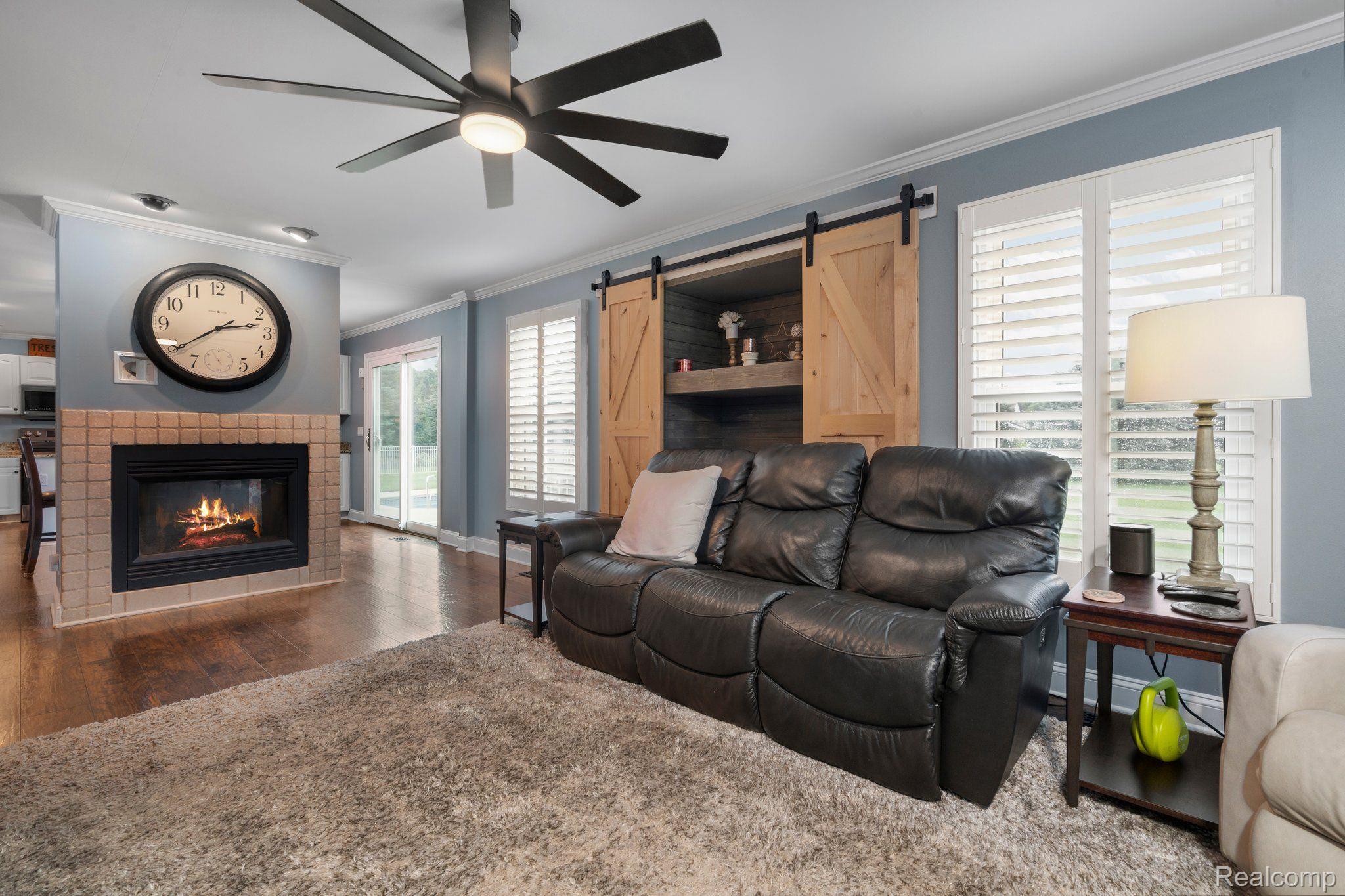 3310 Middle Road Highland, MI 48357 - Photo 9 of 45 With dual sided fireplace