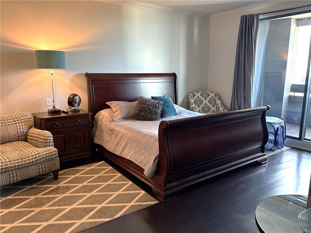 75 14th Street Northeast, Unit 3340 Atlanta, GA 30309 - Photo 11 of 24 a bedroom with double bed and a night stand