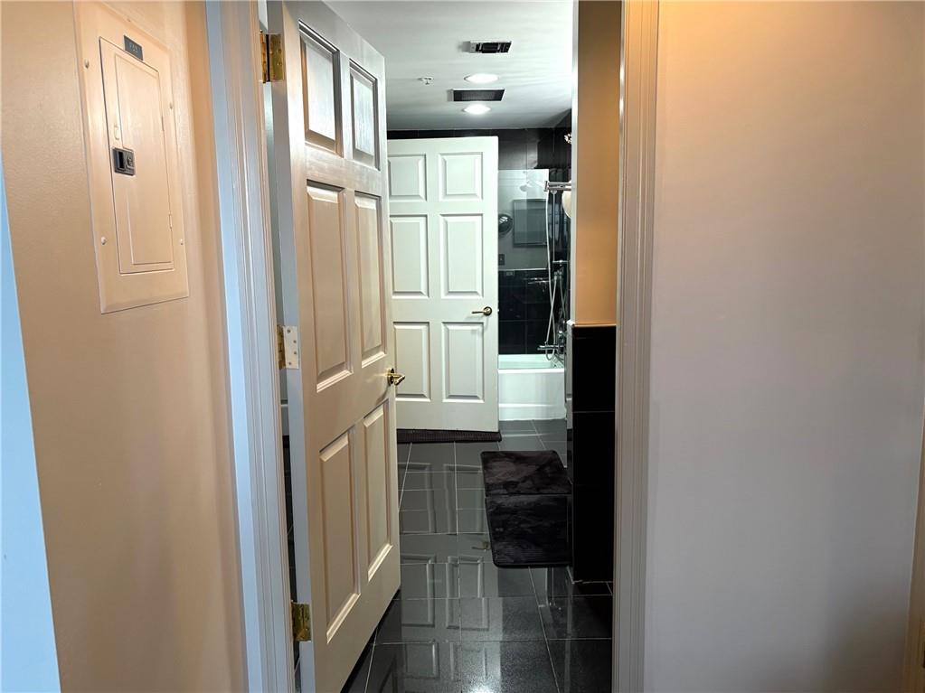 75 14th Street Northeast, Unit 3340 Atlanta, GA 30309 - Photo 13 of 24 a bathroom with a sink and a mirror