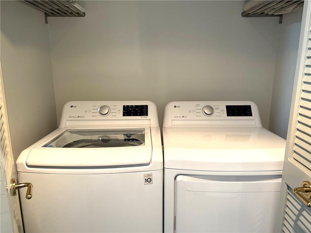 75 14th Street Northeast, Unit 3340 Atlanta, GA 30309 - Photo 16 of 24 a utility room with dryer and washer