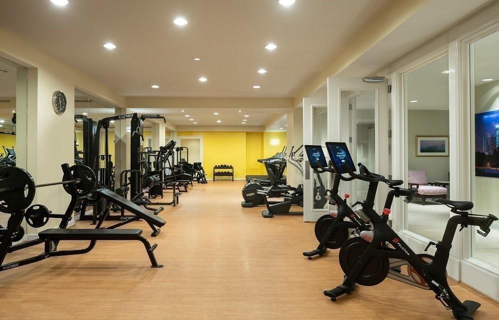 75 14th Street Northeast, Unit 3340 Atlanta, GA 30309 - Photo 22 of 24 a view of a room with gym equipment