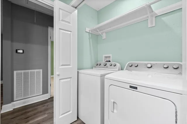 a utility room with dryer and washer