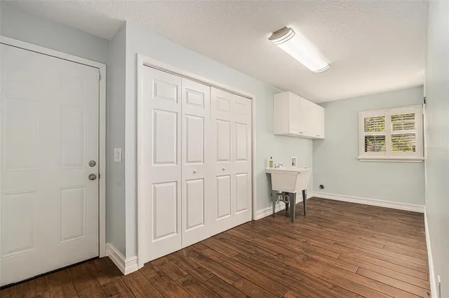 a view of a swimming pool with a yard