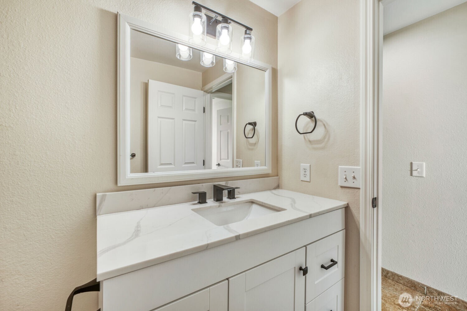 3618 South 243rd Street Kent, WA 98032 - Photo 13 of 37 a bathroom with a sink and a mirror