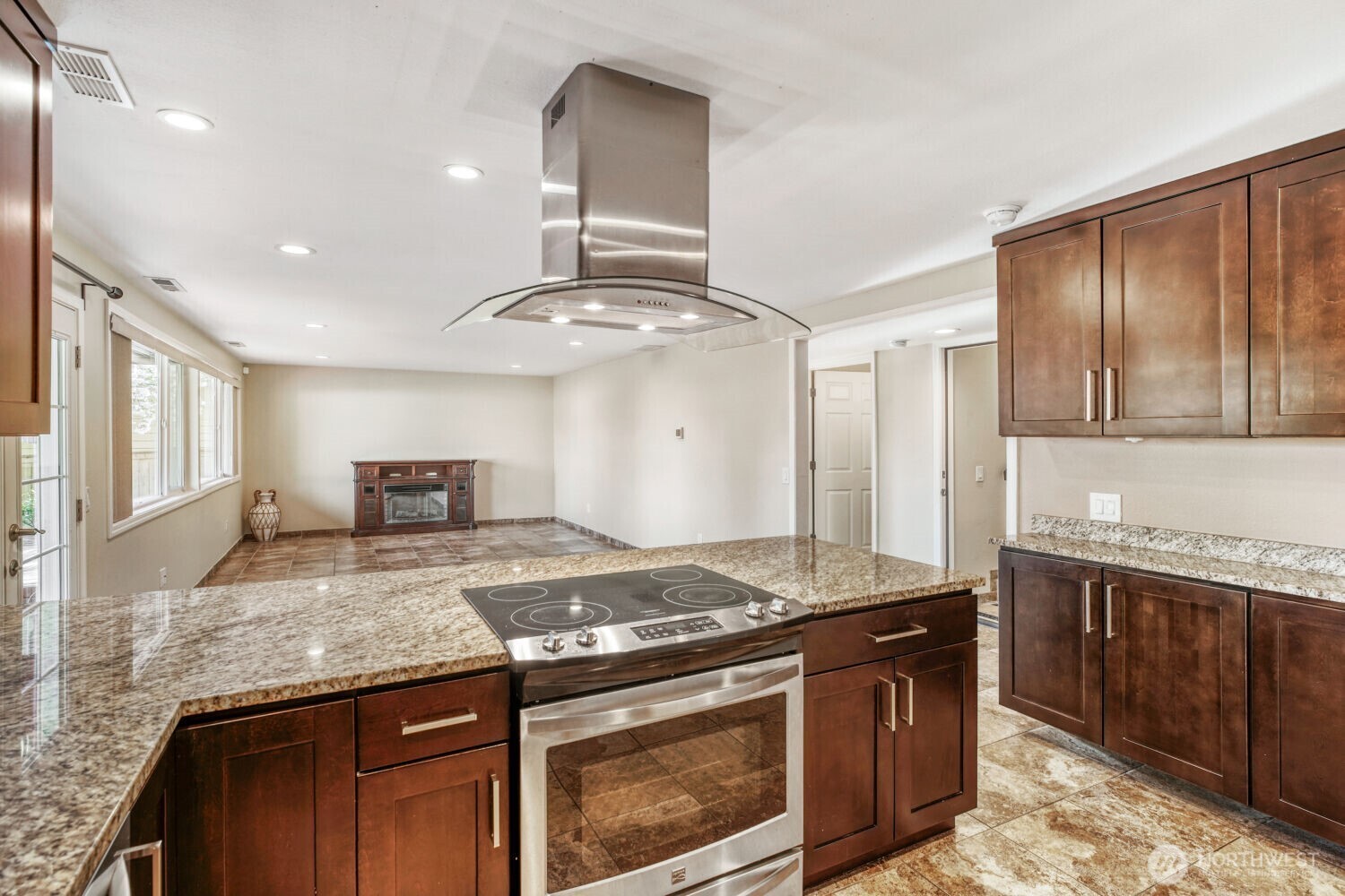 3618 South 243rd Street Kent, WA 98032 - Photo 18 of 37 a kitchen with a stove and a sink