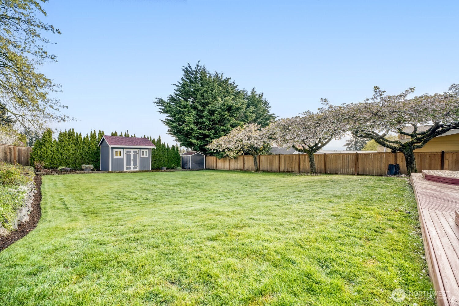 3618 South 243rd Street Kent, WA 98032 - Photo 23 of 37 a fire hydrant in the middle of a field