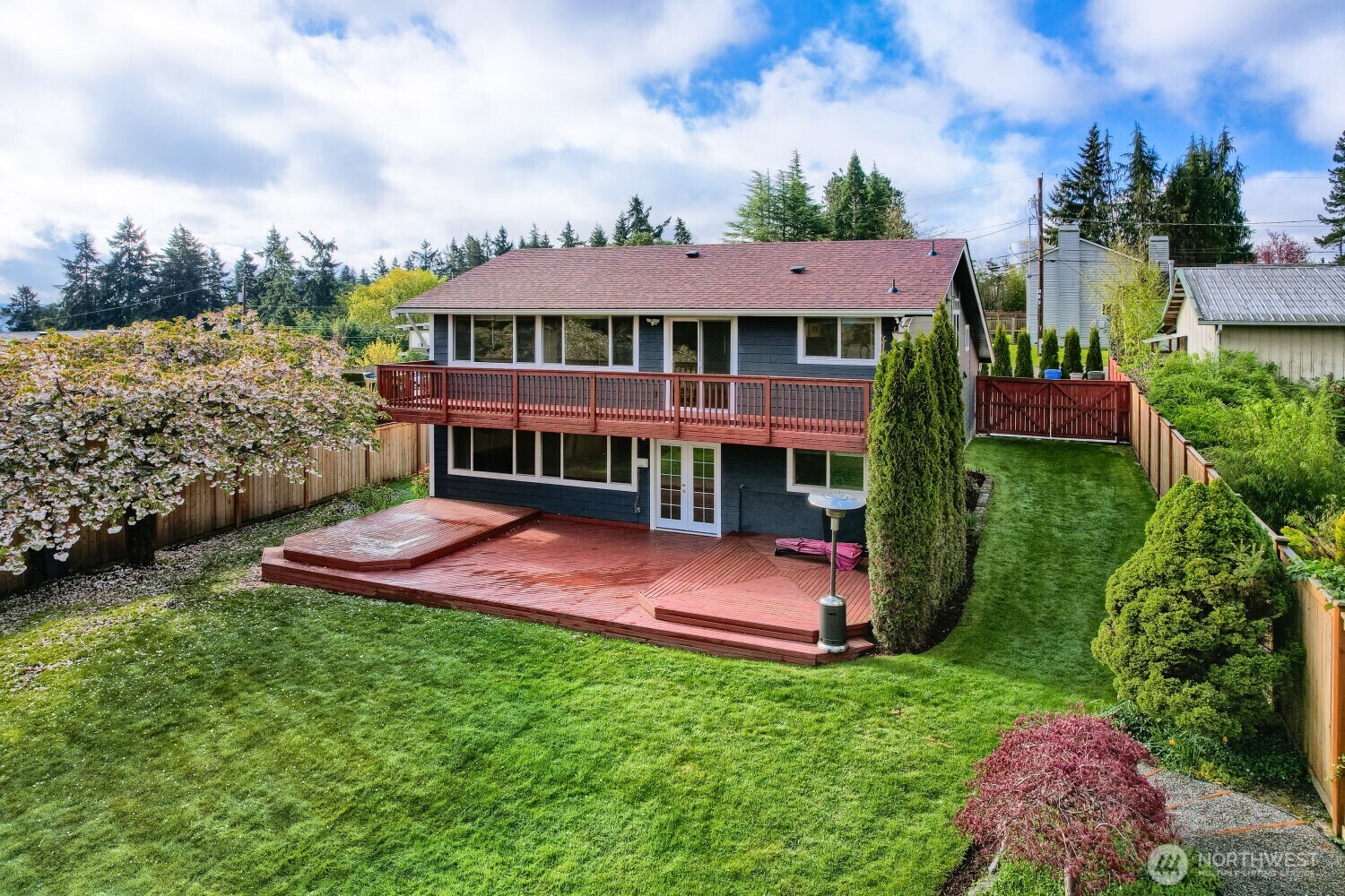 3618 South 243rd Street Kent, WA 98032 - Photo 3 of 37 aerial view of a house with a big yard potted plants and large tree
