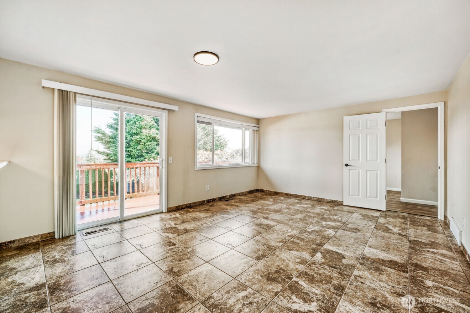 3618 South 243rd Street Kent, WA 98032 - Photo 5 of 37 a view of an empty room and window