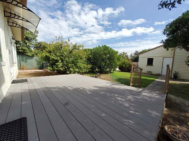 a view of a backyard of the house
