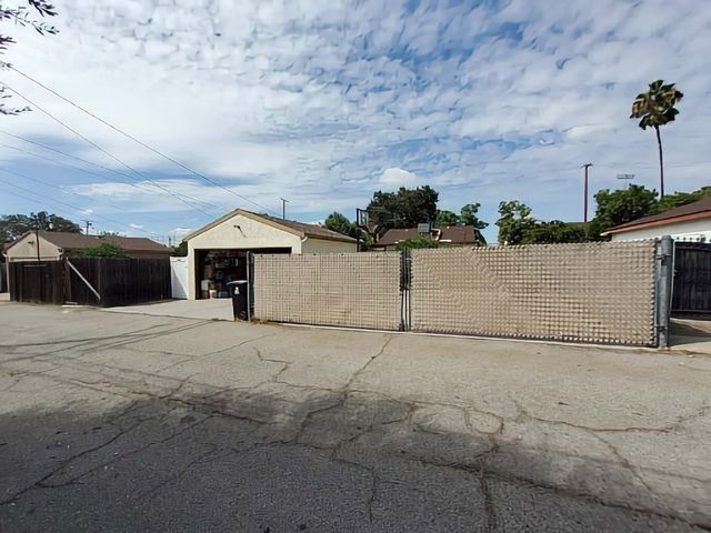 a view of a backyard of a house