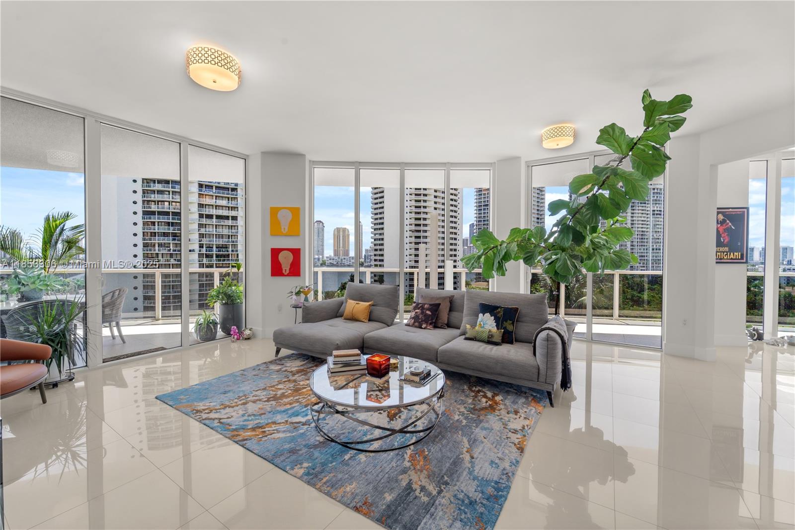 a living room with furniture and a potted plant
