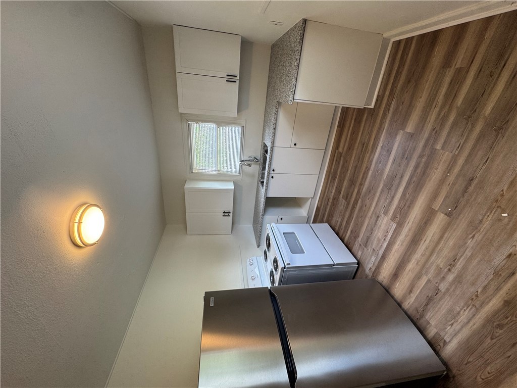 408 Hill Street, Unit B Bryan, TX 77803 - Photo 1 of 1 a kitchen with stainless steel appliances granite countertop a refrigerator a stove a sink and a microwave