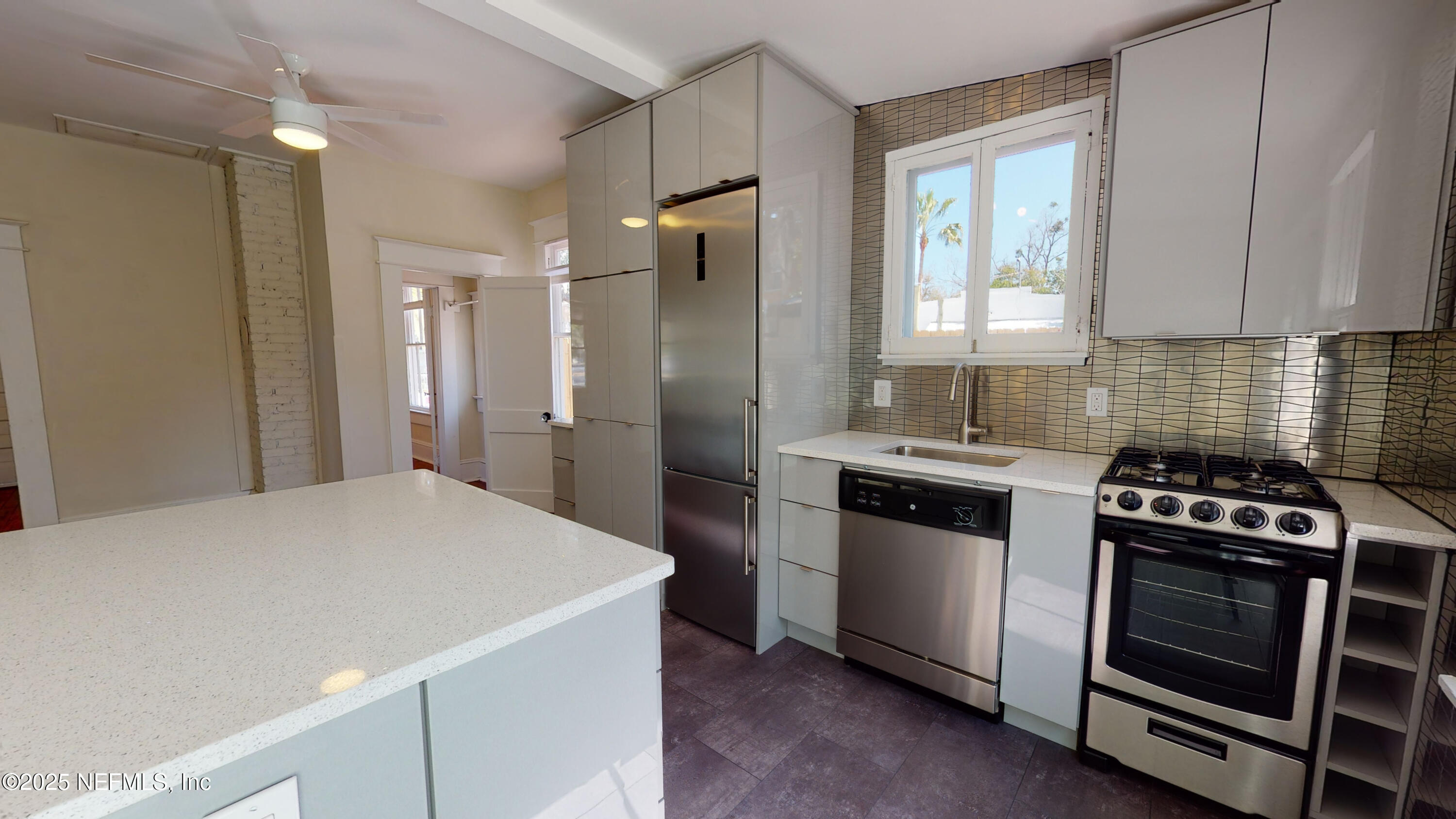 11 Hildreth Drive St. Augustine, FL 32084 - Photo 14 of 25 a kitchen with a stove and a refrigerator