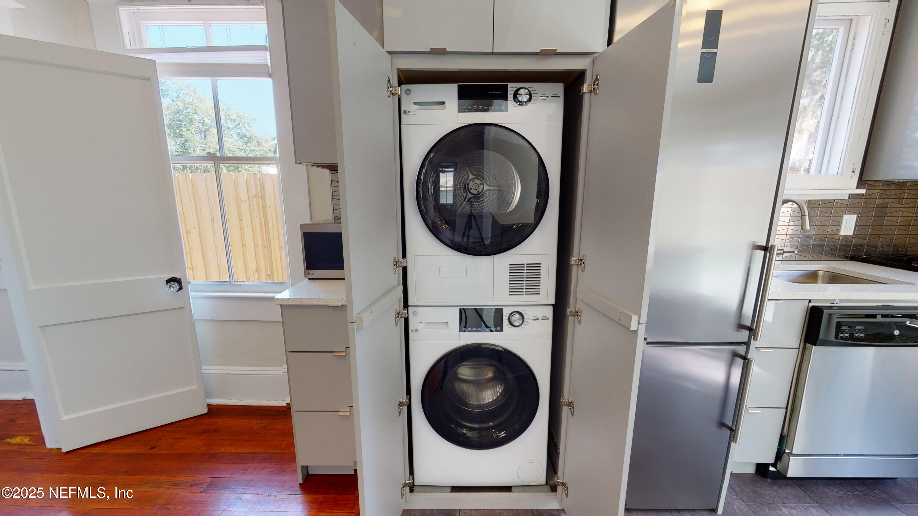 11 Hildreth Drive St. Augustine, FL 32084 - Photo 15 of 25 a utility room with wooden floor washer and dryer
