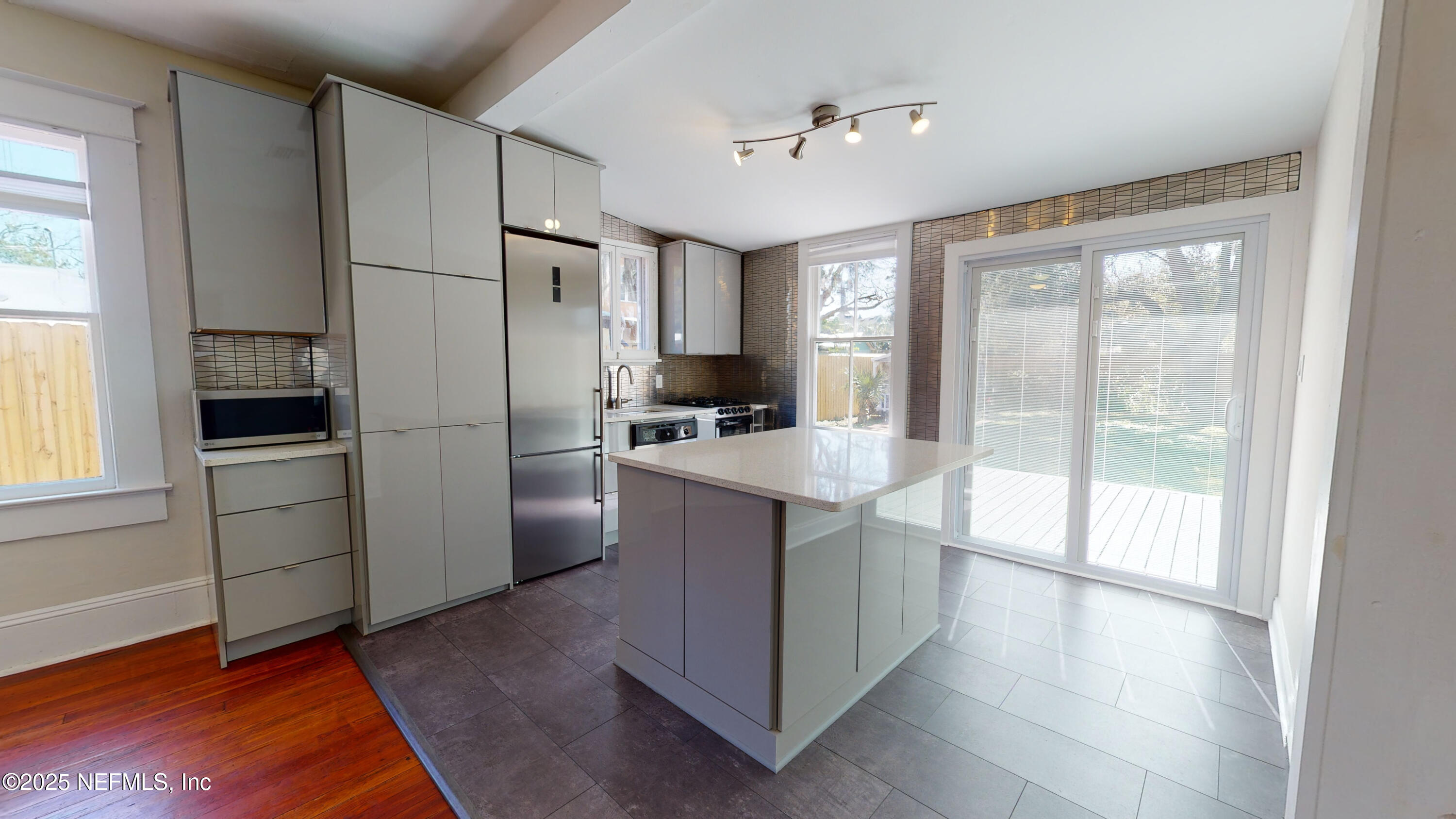 11 Hildreth Drive St. Augustine, FL 32084 - Photo 16 of 25 a kitchen with stainless steel appliances a refrigerator and a stove