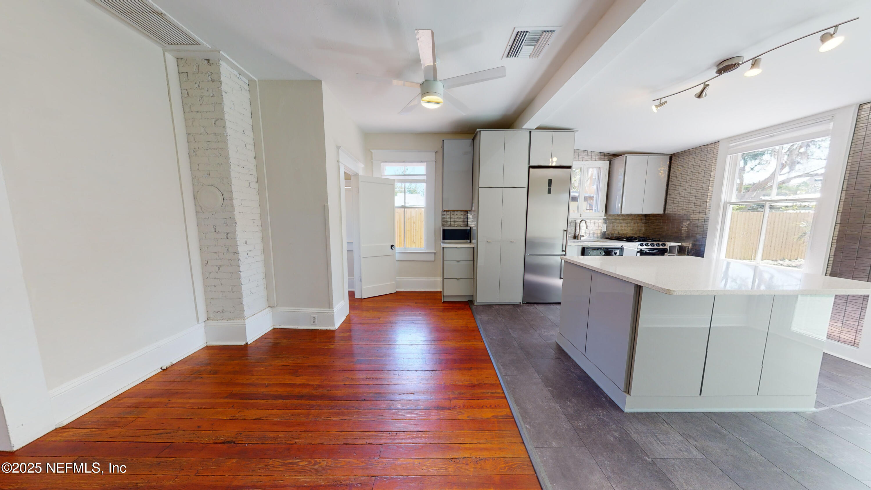 11 Hildreth Drive St. Augustine, FL 32084 - Photo 5 of 25 a view of kitchen with stainless steel appliances kitchen island hardwood floor and a sink