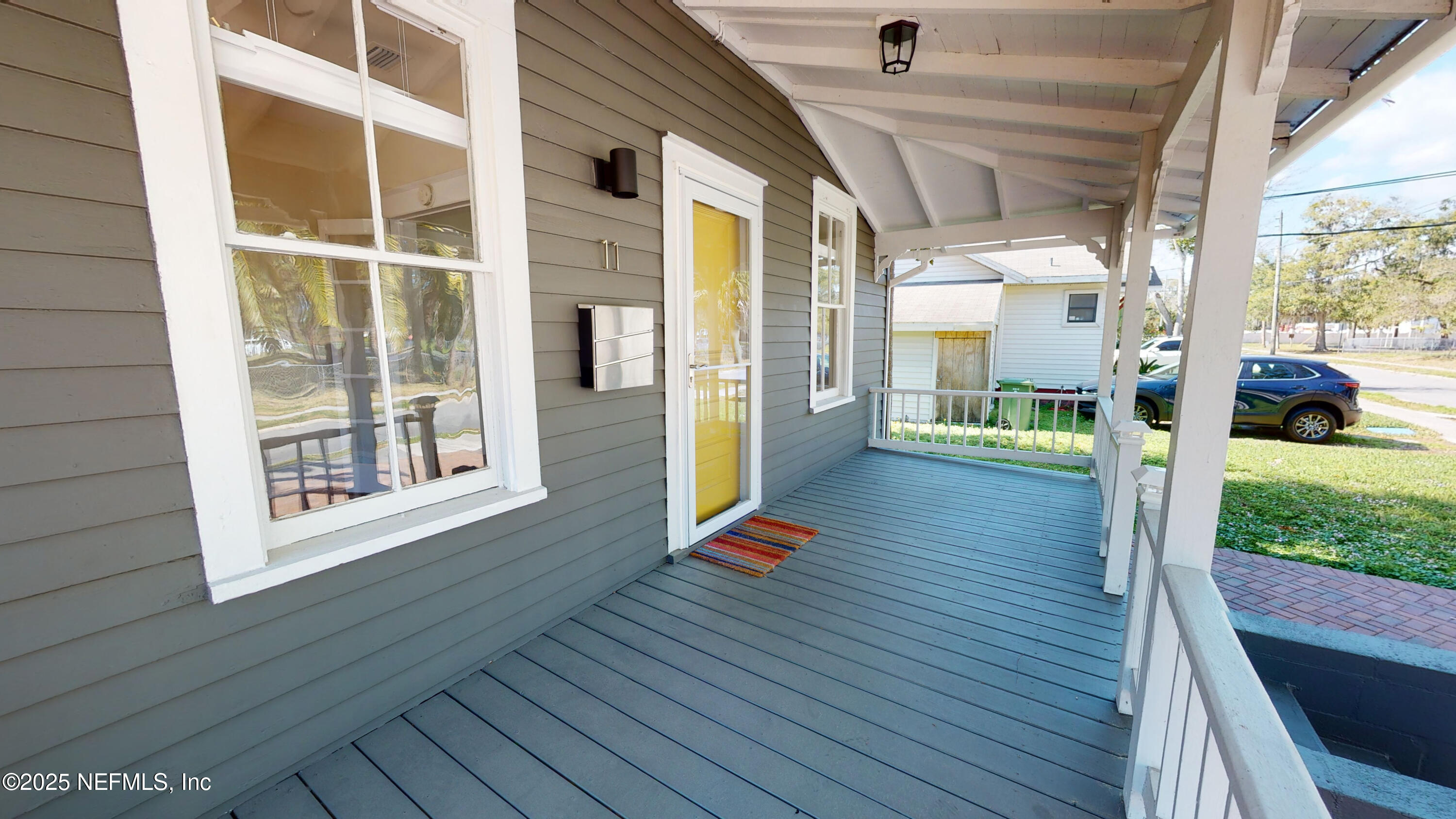 11 Hildreth Drive St. Augustine, FL 32084 - Photo 6 of 25 a front view of a house with a porch
