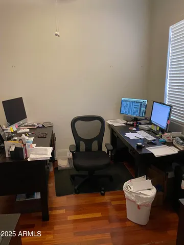 a view of a workspace with furniture