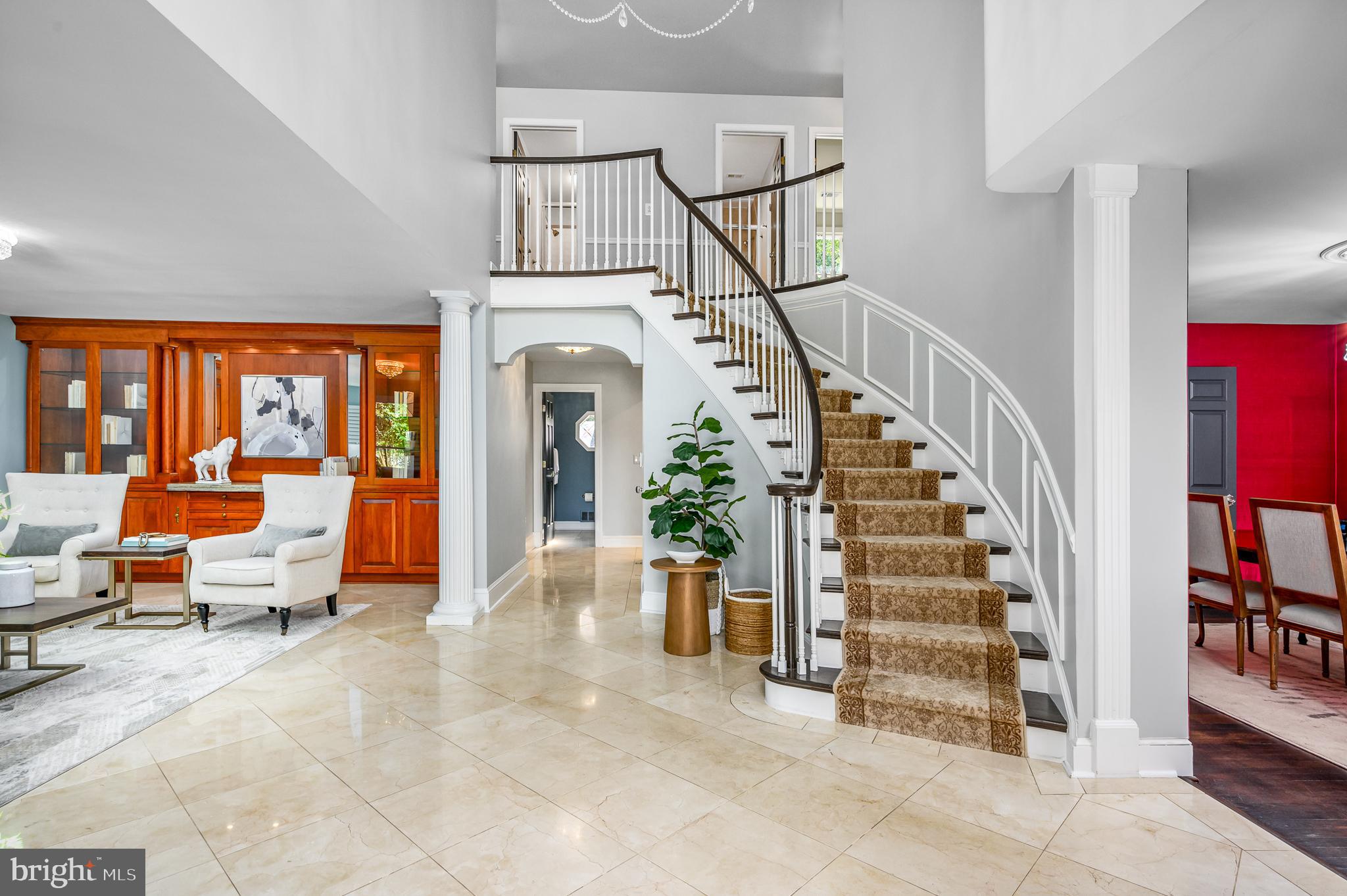 337 River Bend Road Great Falls, VA 22066 - Photo 12 of 92 Curved staircase to upper level bedrooms