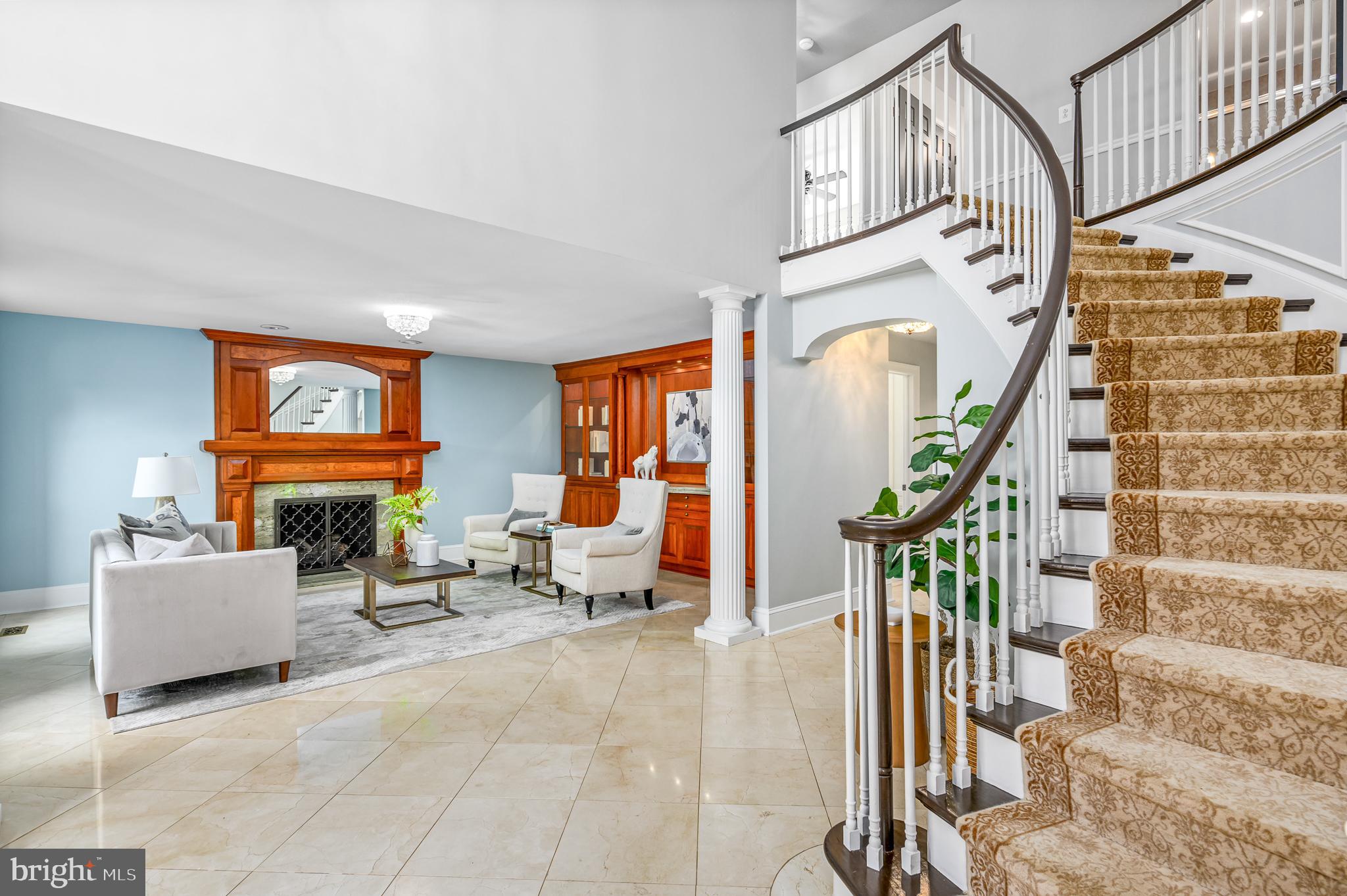 337 River Bend Road Great Falls, VA 22066 - Photo 13 of 92 Foyer to formal living room with custom shelving