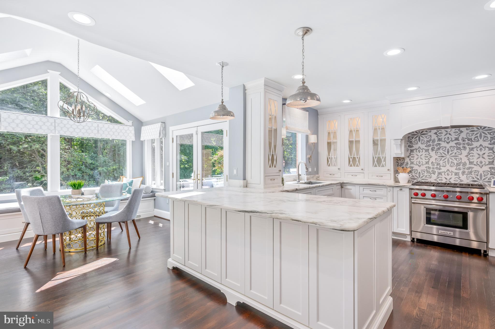 337 River Bend Road Great Falls, VA 22066 - Photo 19 of 92 Kitchen peninsula with honed marble countertop