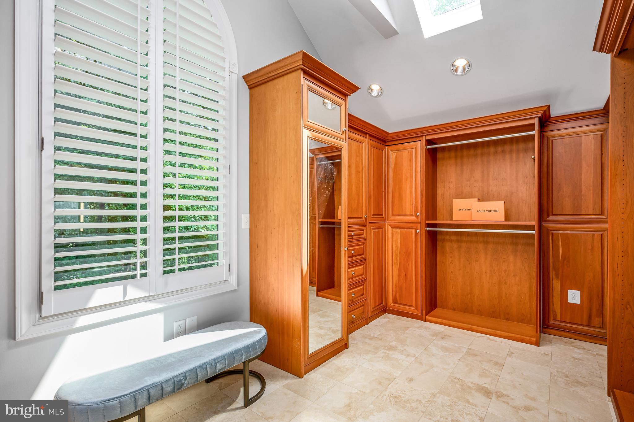 337 River Bend Road Great Falls, VA 22066 - Photo 37 of 92 Large walk-in closet with custom shelving